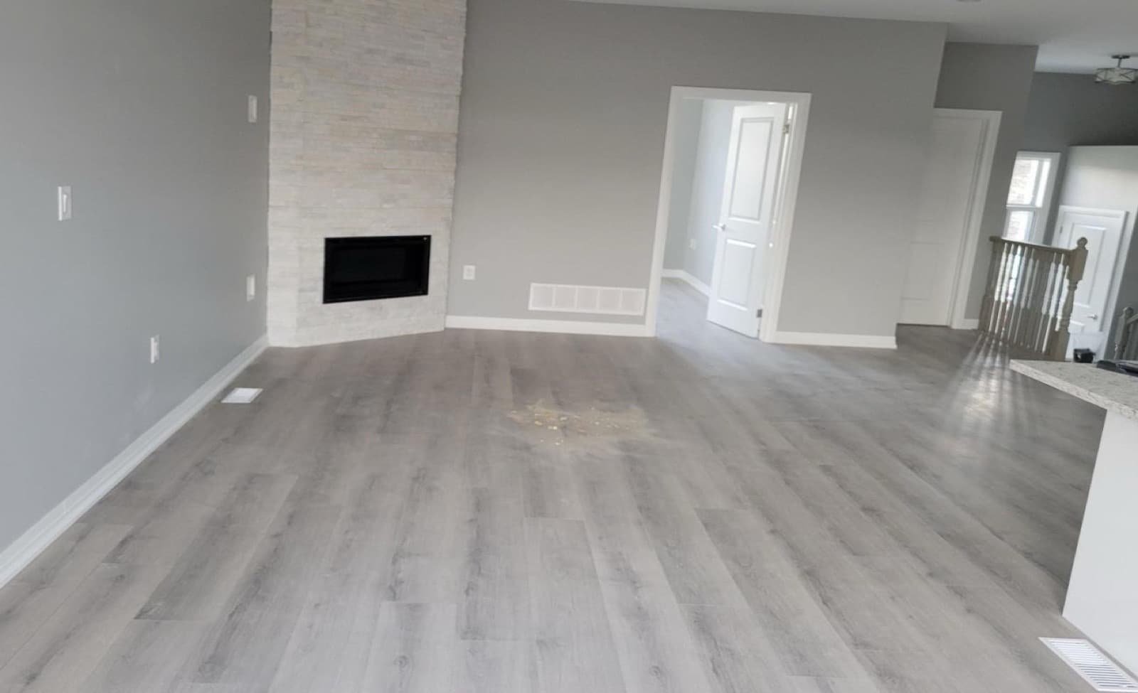 Dark, underexposed interior with blown-out windows